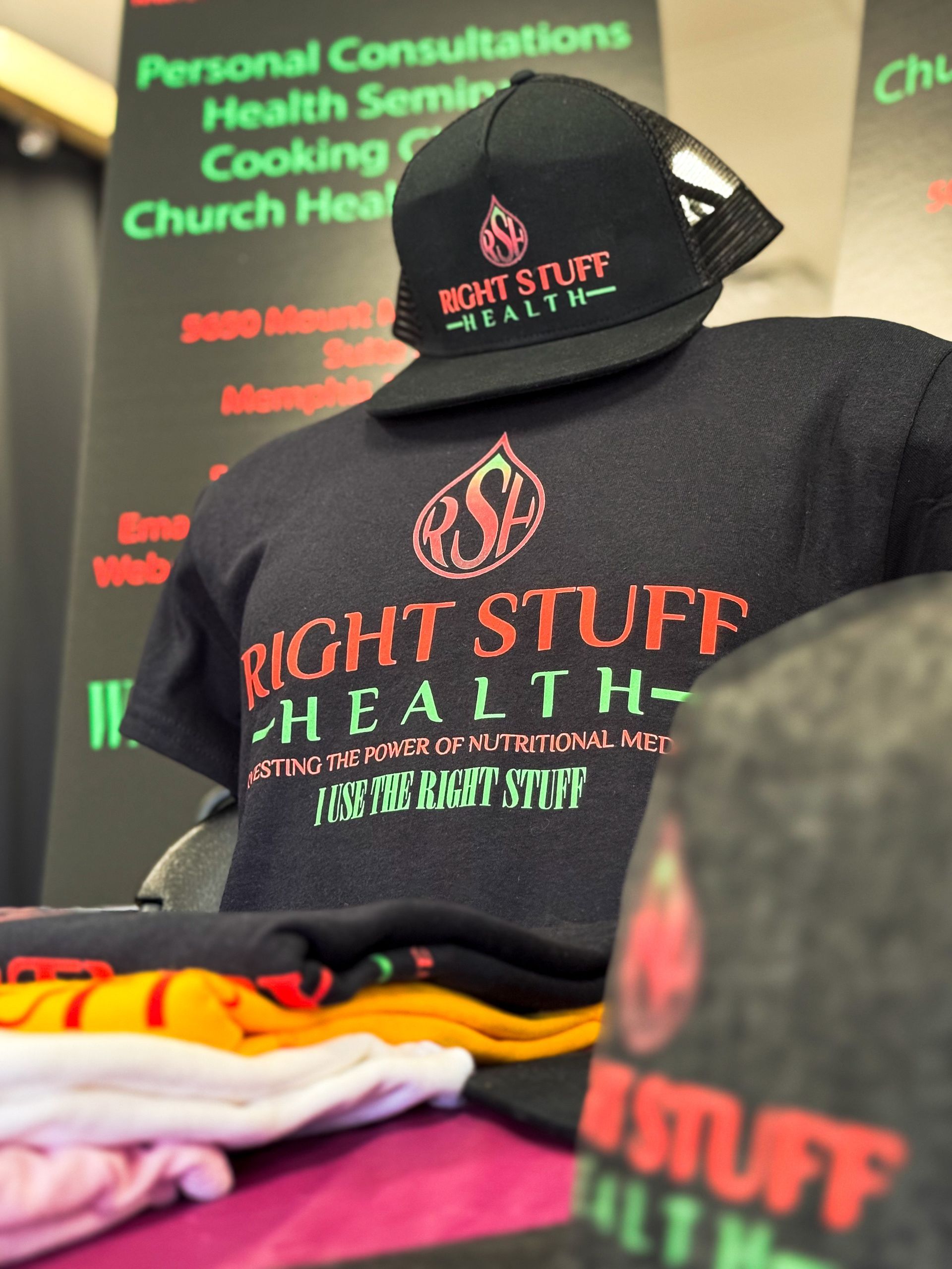 A black shirt that says right stuff health on it