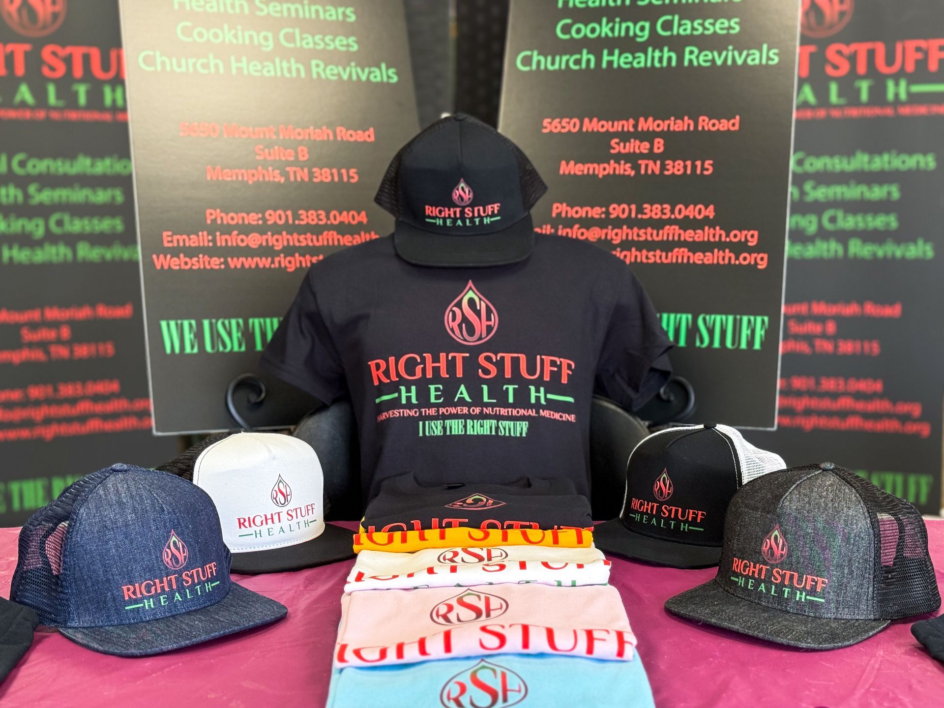 A display of hats and shirts for right stuff health