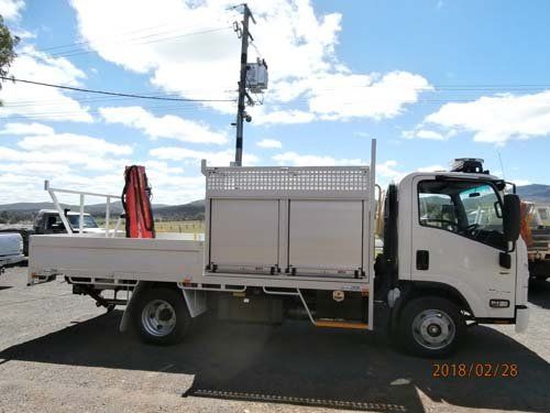 white workman truck with storage