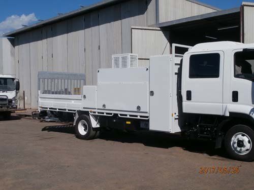 white workman truck with boxes