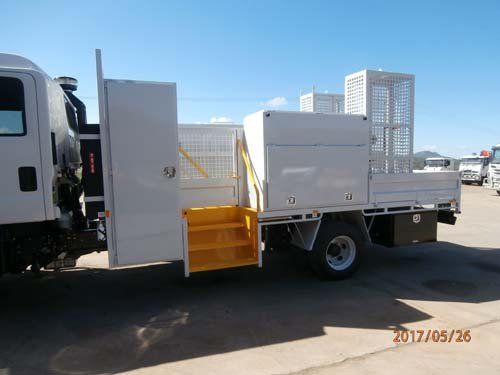 white workman truck yellow stairs