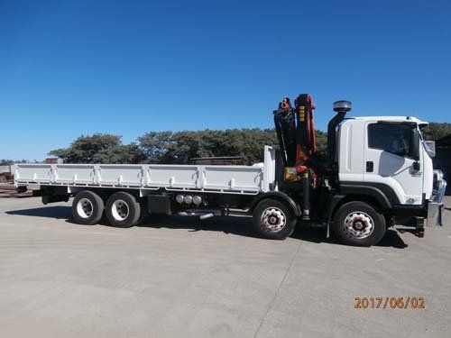 white workman truck with trailer