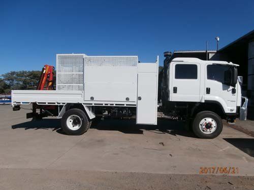 white workman truck with caging