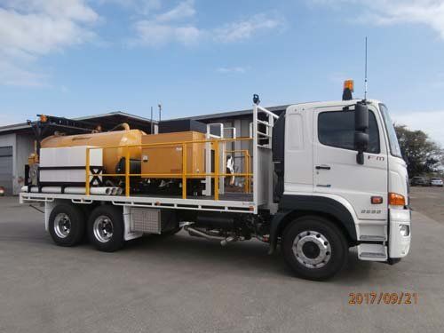 white workman truck with equipment
