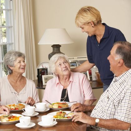 a plate of sandwiches on a table with the words lunch & learn on it
