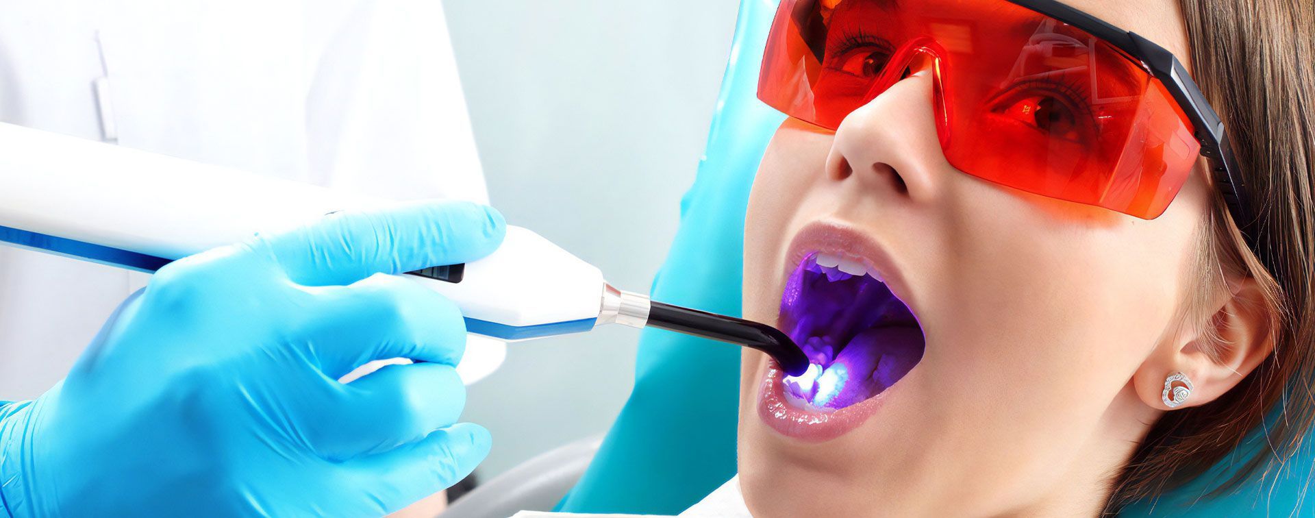 A Woman is Getting Her Teeth Whitened — Advanced Dental Southern Highlands in Moss Vale, NSW