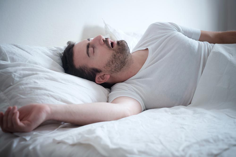Man Sleeping With His Mouth Open