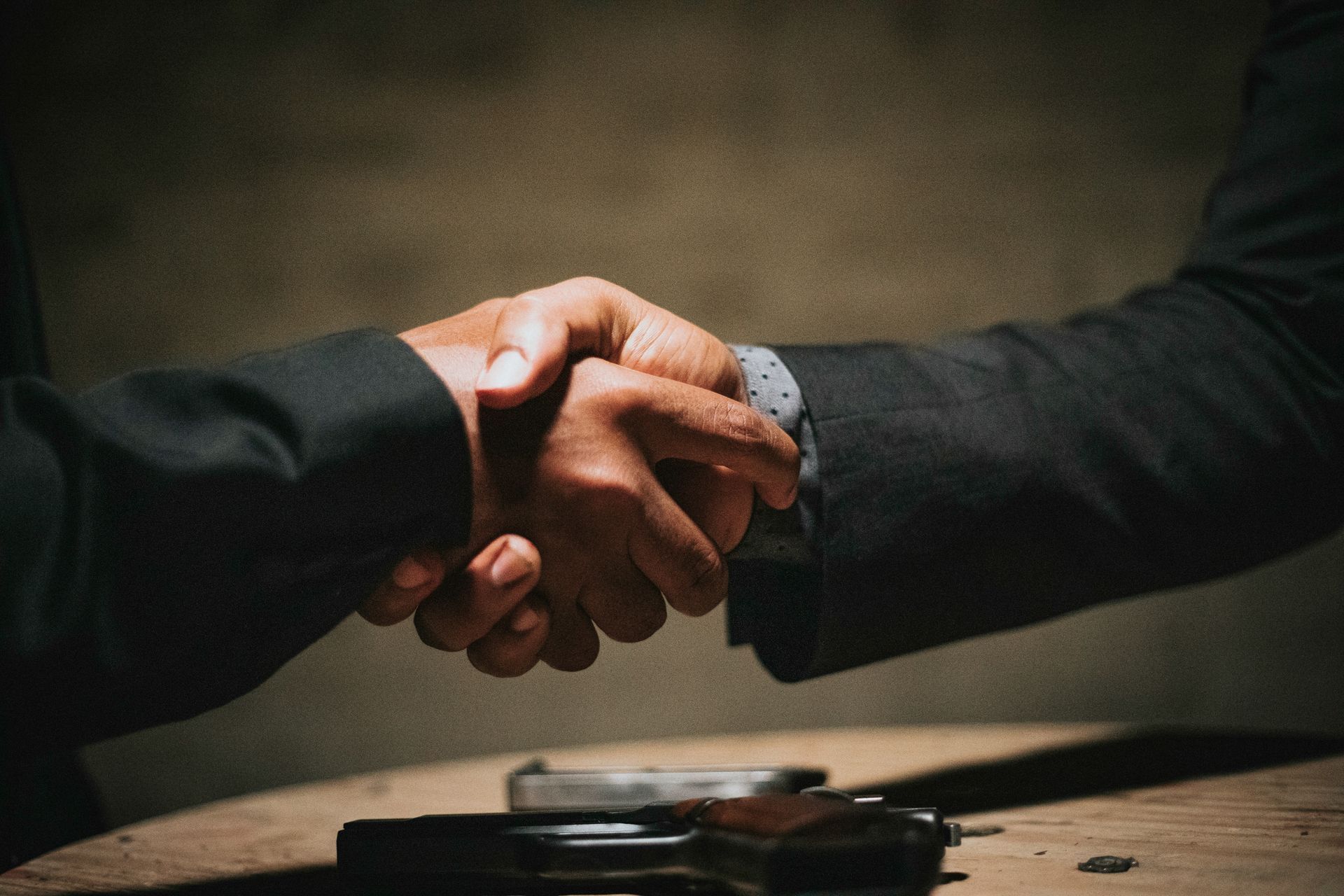 Two business people shaking hands