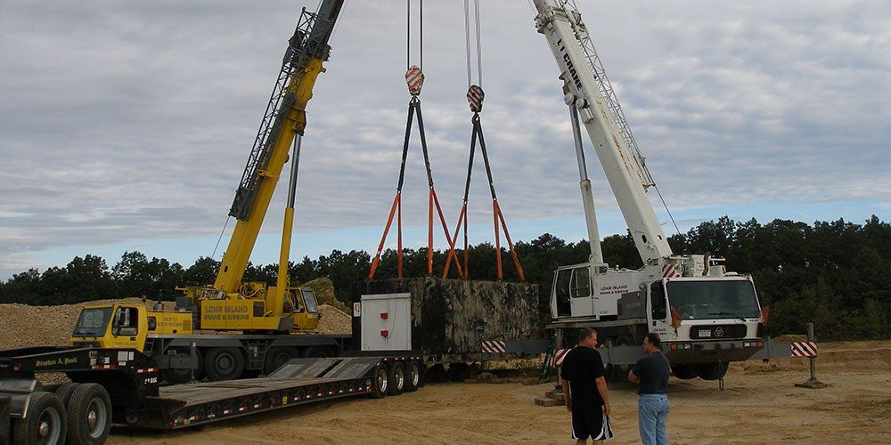 Two 100 Ton Cranes Moving A 120,000 lb Concrete Bunker in Brookhaven