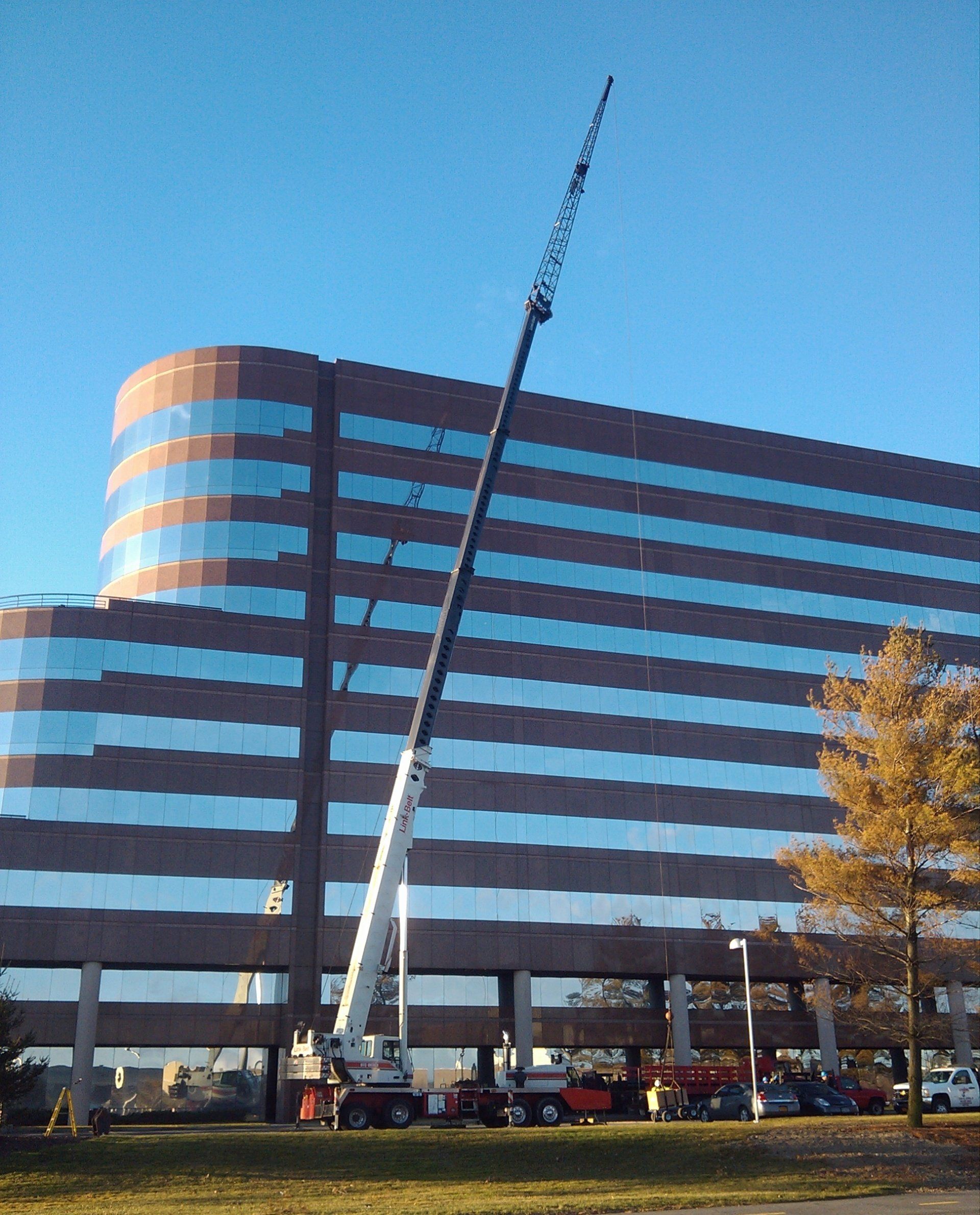 70 Ton Linkbelt Setting Rooftop Equipment On A 120' High Office Building in Uniondale