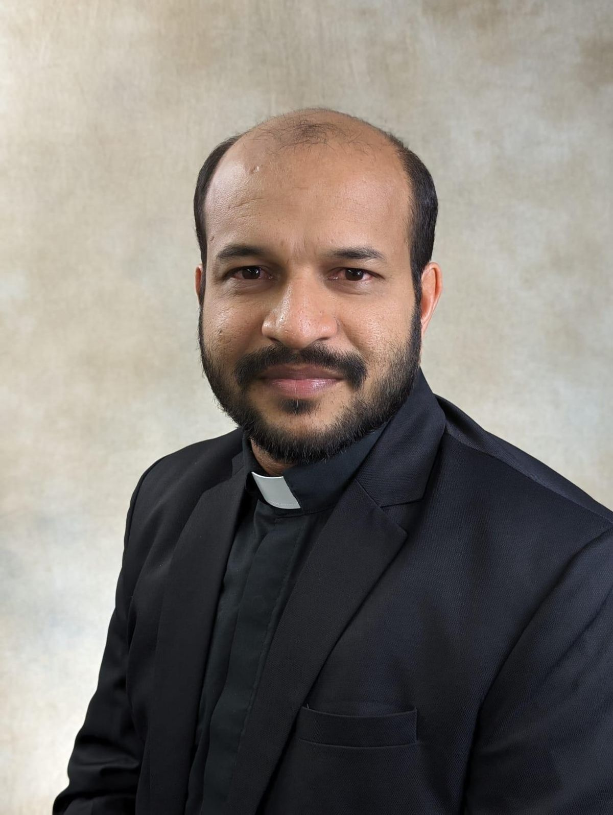 Father Shinu Lukos, C.S.T