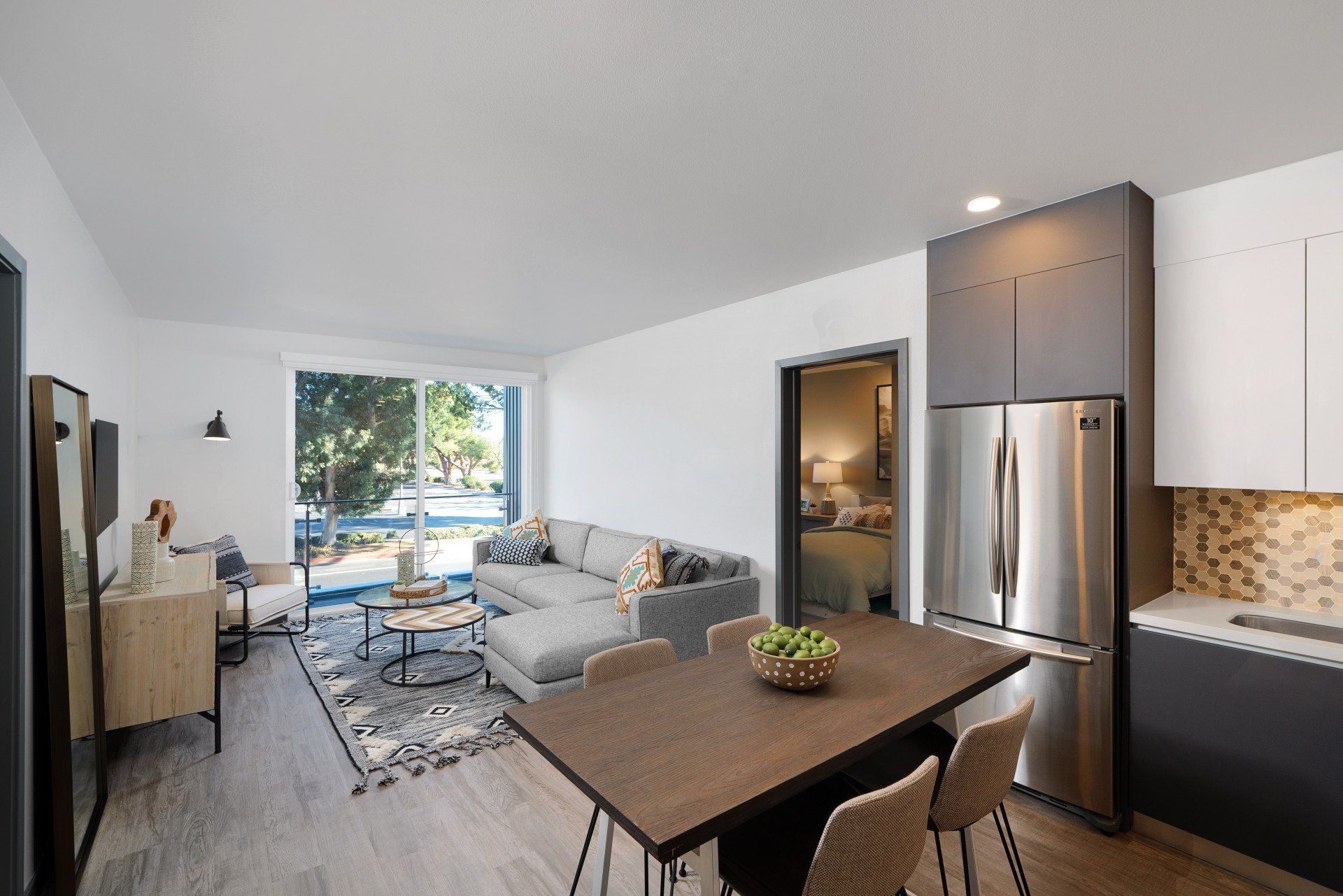 Aspire Apartment Living Room Seen From Kitchen Photo