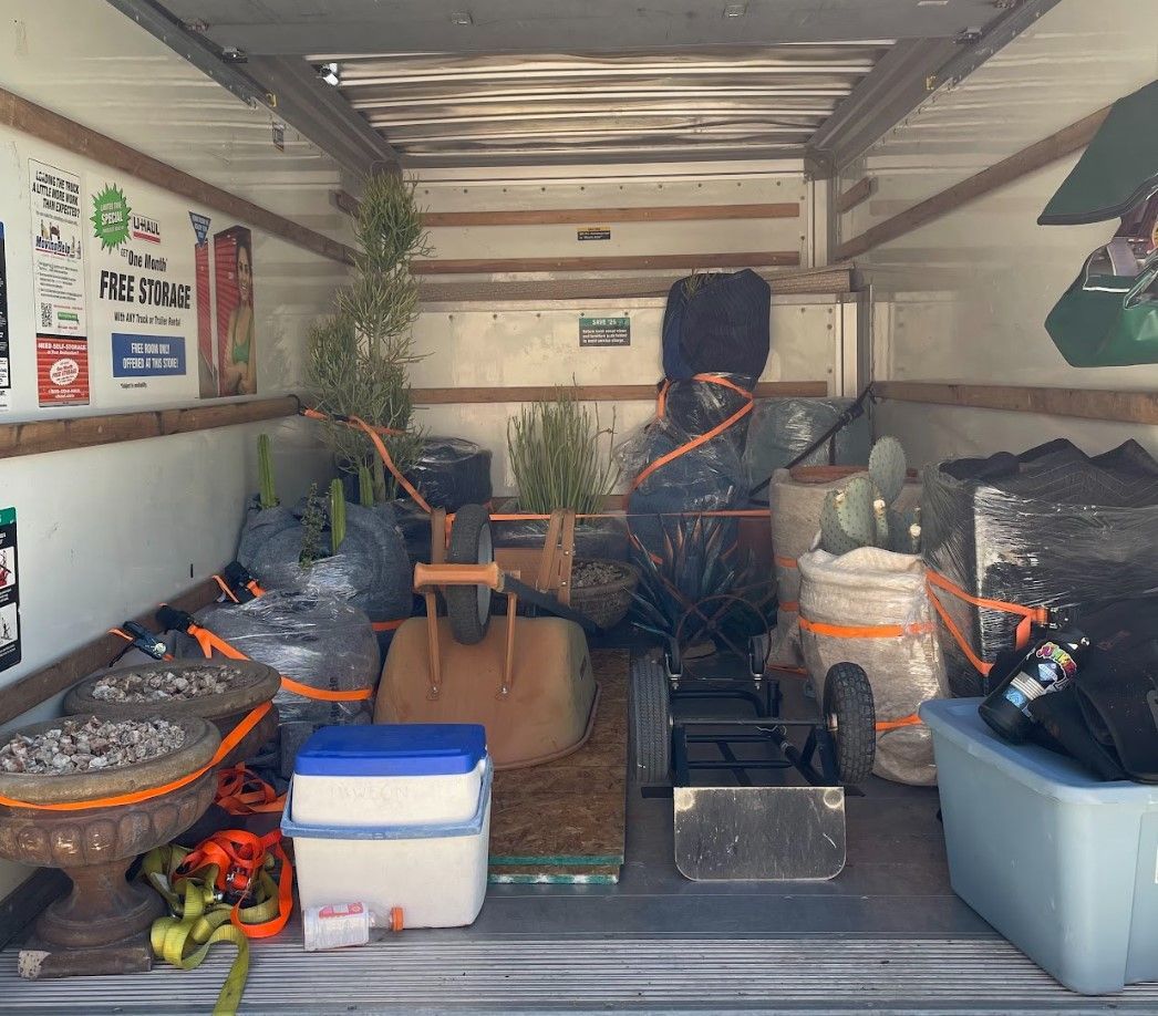 The inside of a moving truck filled with lots of items