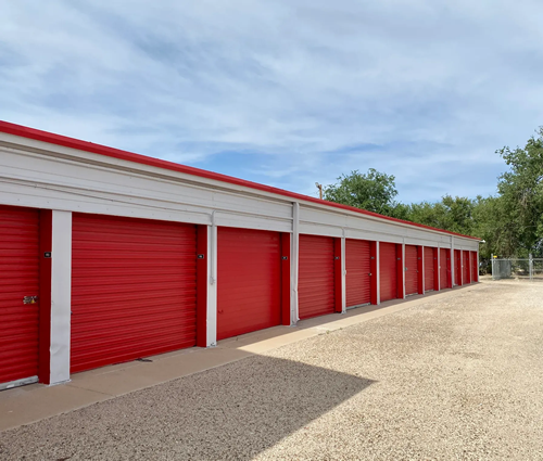 User friendly drive-up storage units with red doors located at 700 S. Grimes Street in Hobbs, NM.