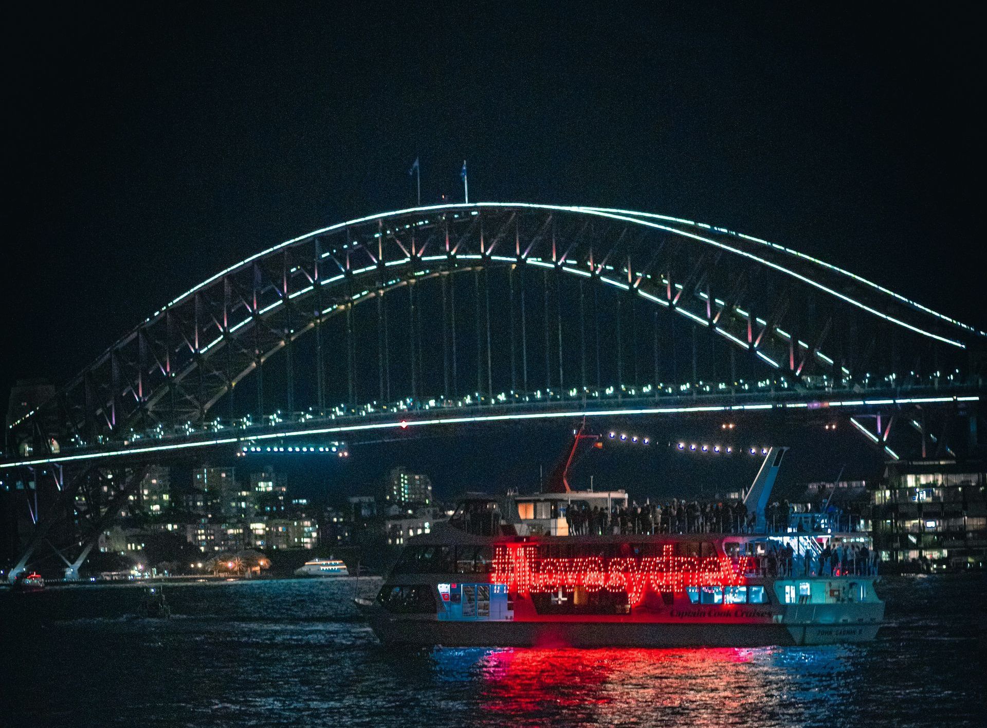 Night view of the Sydney Harbour Bridge.