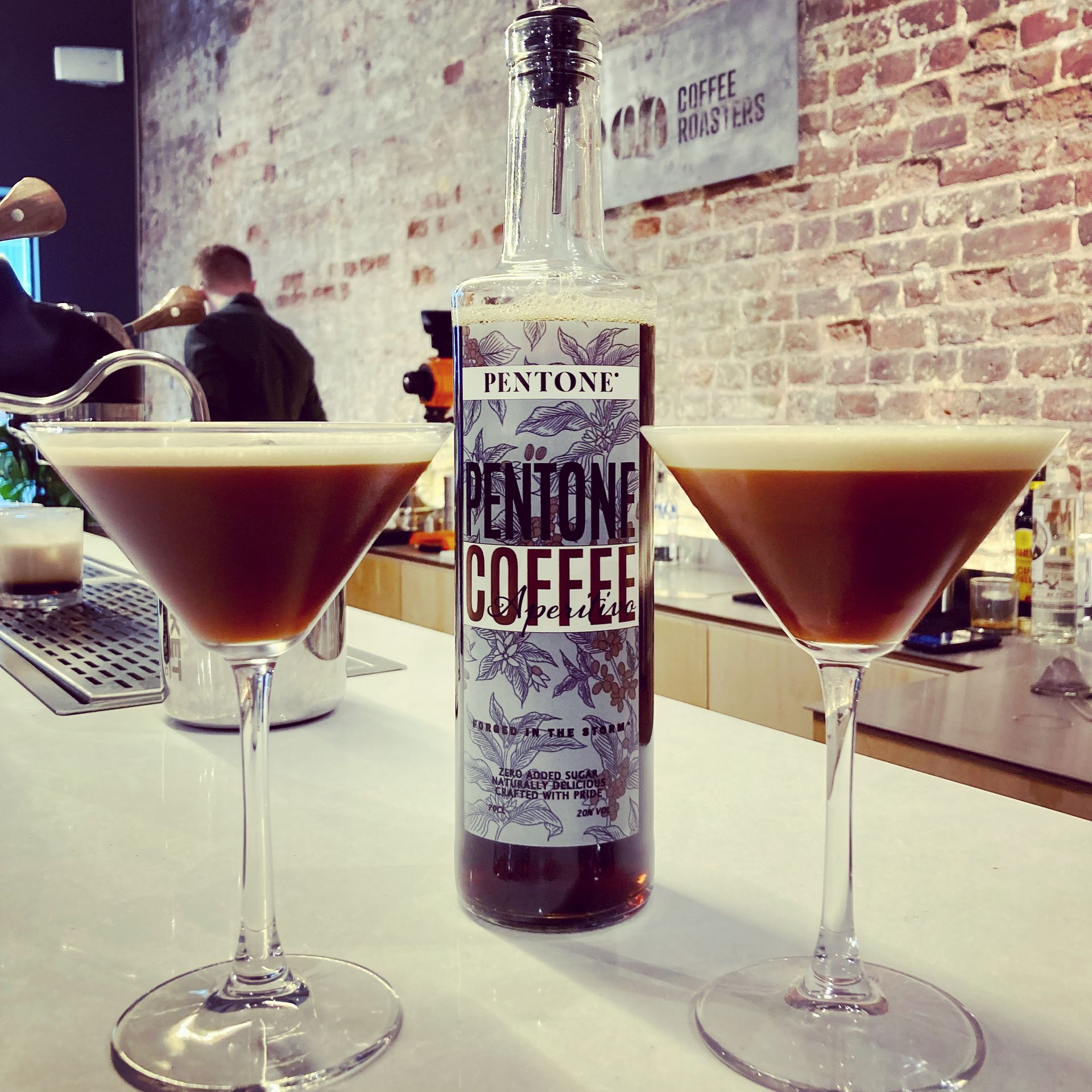 A bottle of Aperitivo pentone coffee on a white background.