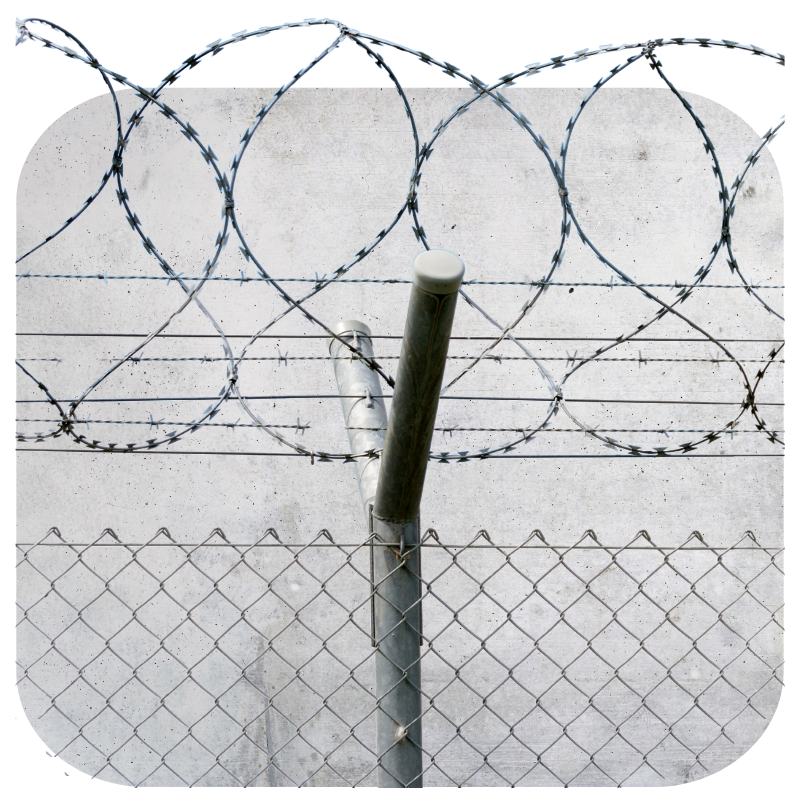 a chain link fence with barbed wire on it