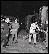 A group of four men fueling the truck - Aliquippa, PA - Woodlawn Oil Co.