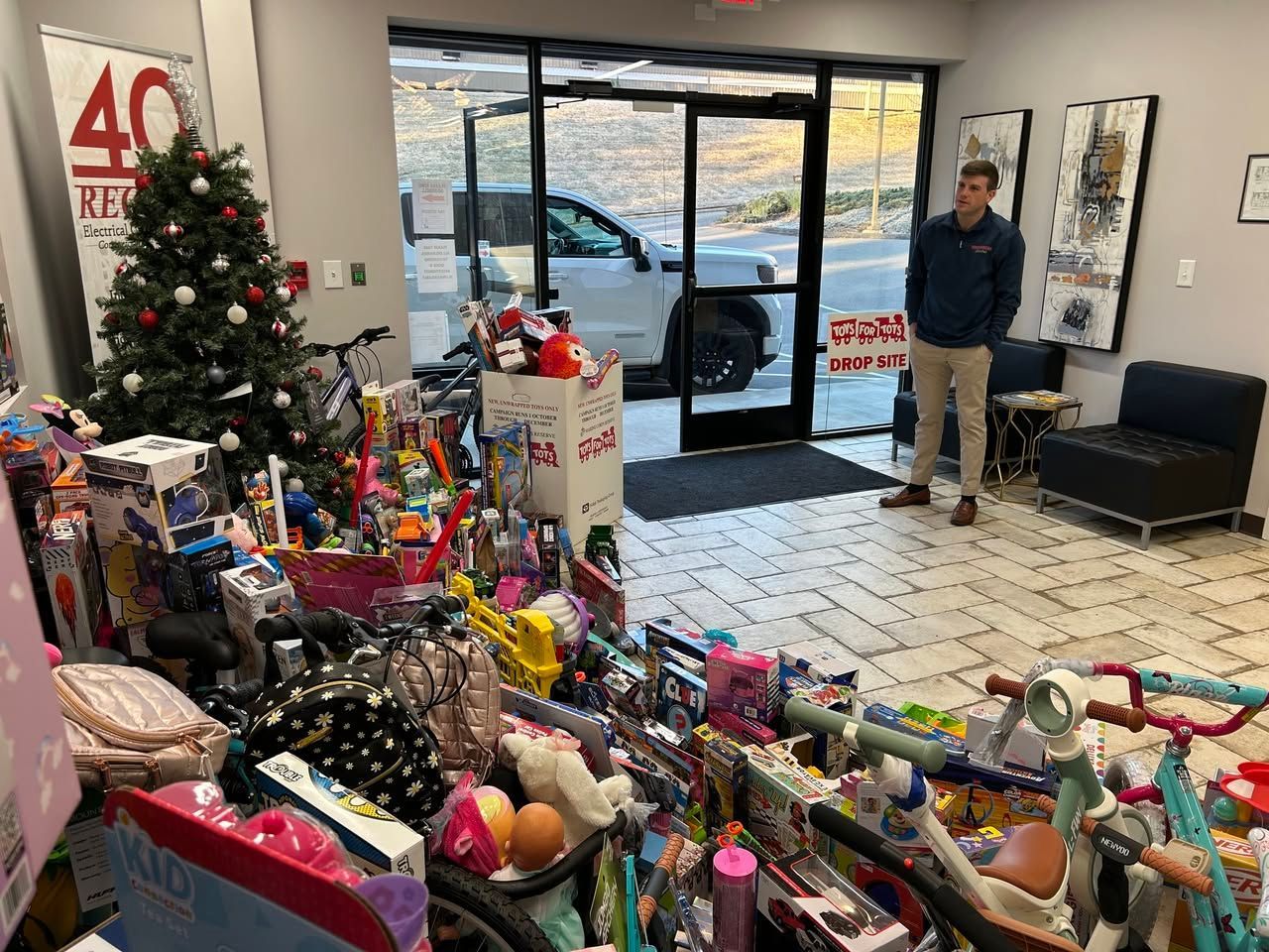 Spreading Holiday Joy: Recore Electric's Successful Toys for Tots Drive
