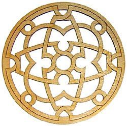 A wooden circle with a celtic design on it on a white background.