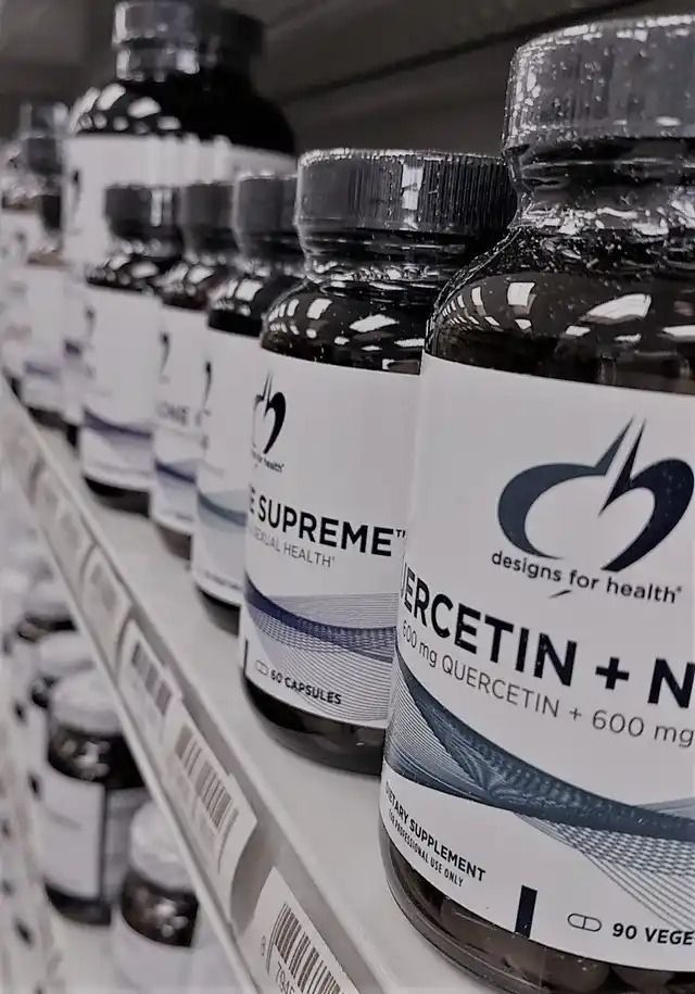 A Row of Bottles of Ercetin+N on a Shelf in a Store