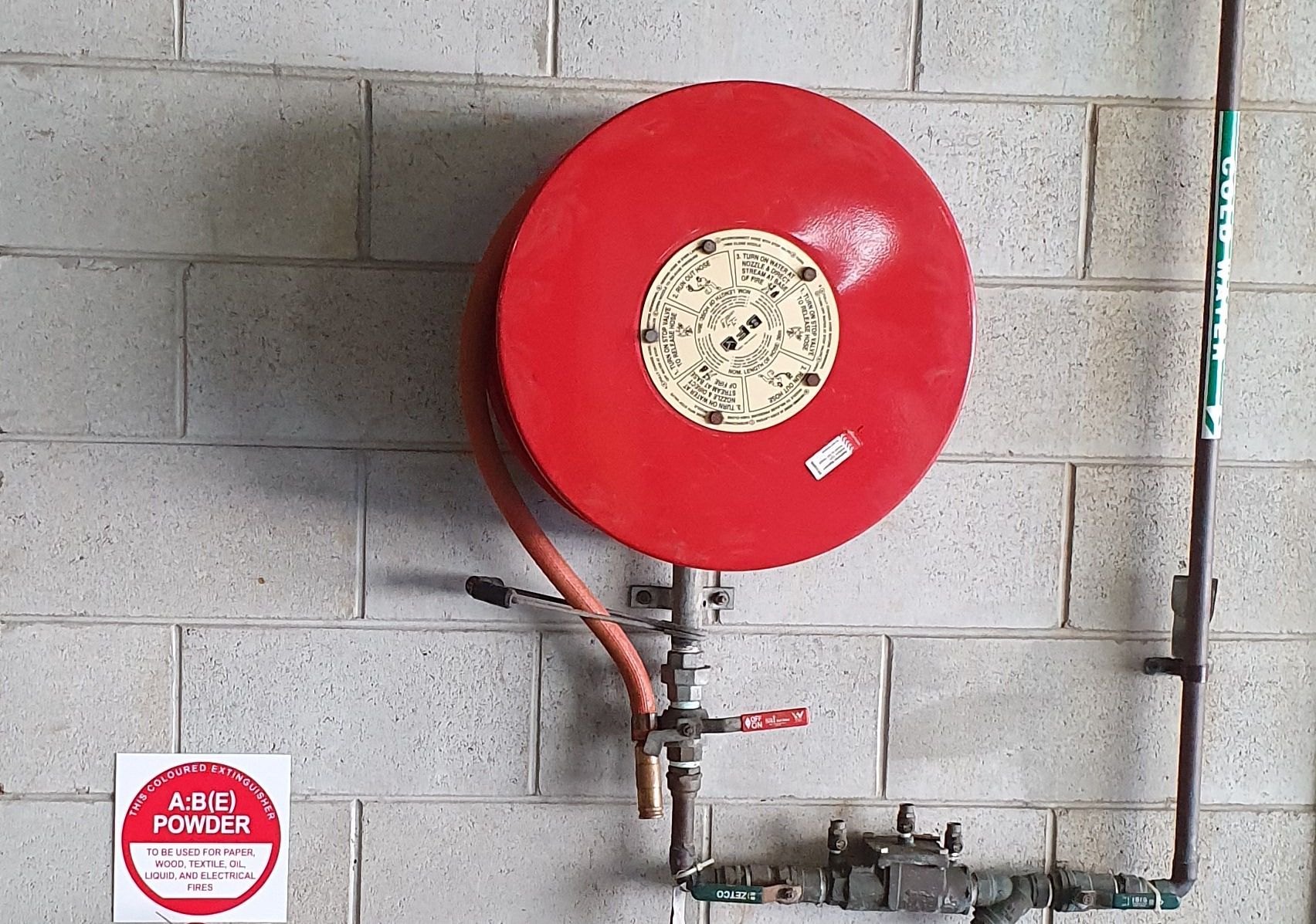 Fire Hose on Fire Engine — Fire Protection Services in Goonellabah, NSW