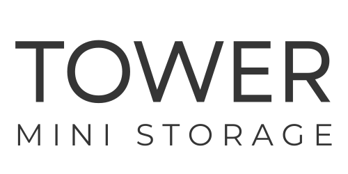 The logo for tower mini storage is black and white.