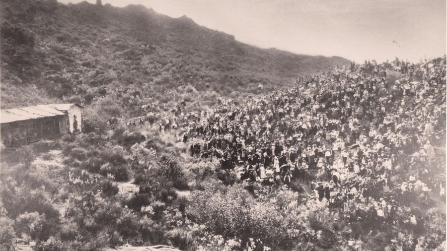 Photo of the crowd and stage at the first performance of 