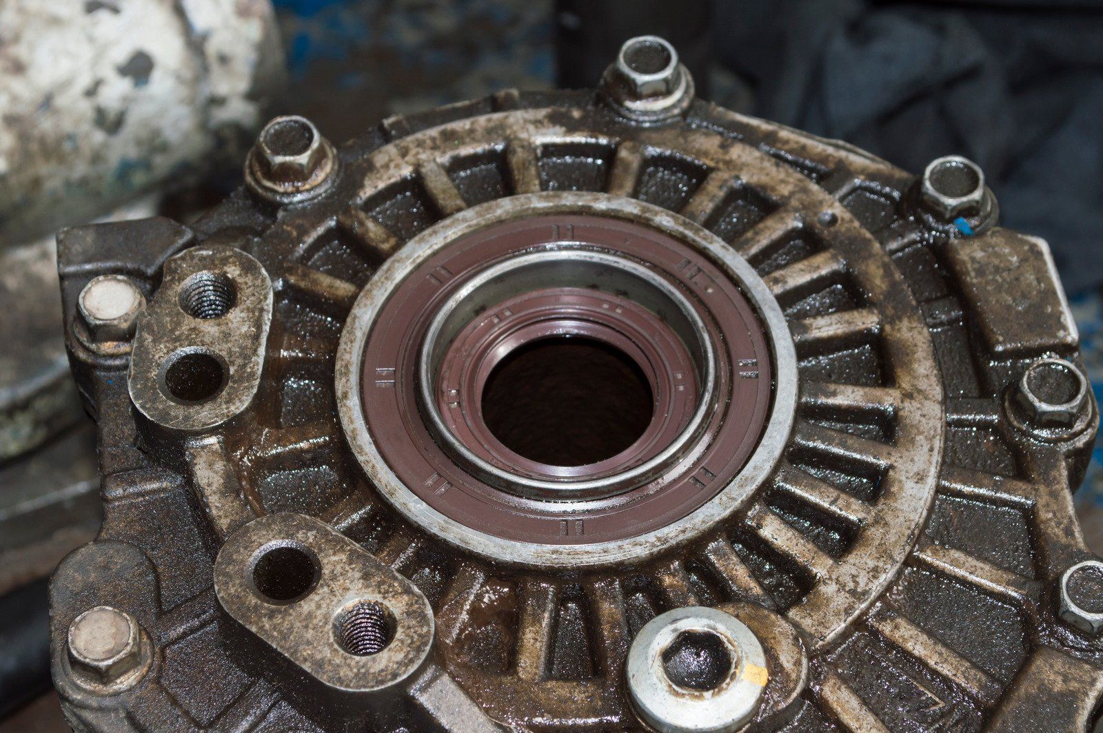 A close up of a metal object with a hole in the middle.