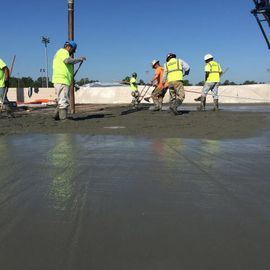 Men laying concrete