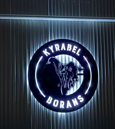 A laser cut sign that says kyrabel borans on it