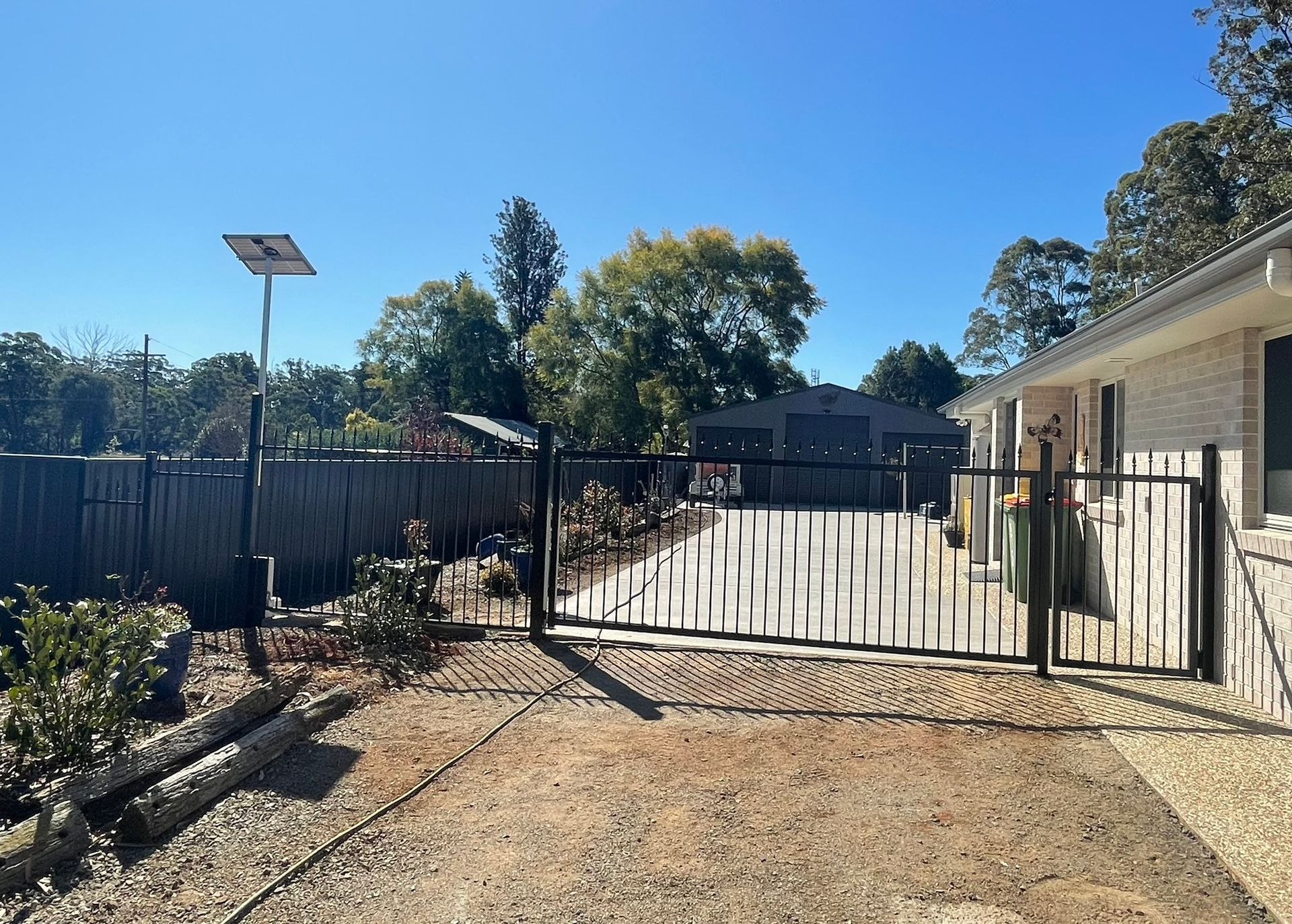A house with a solar panel on the side of it