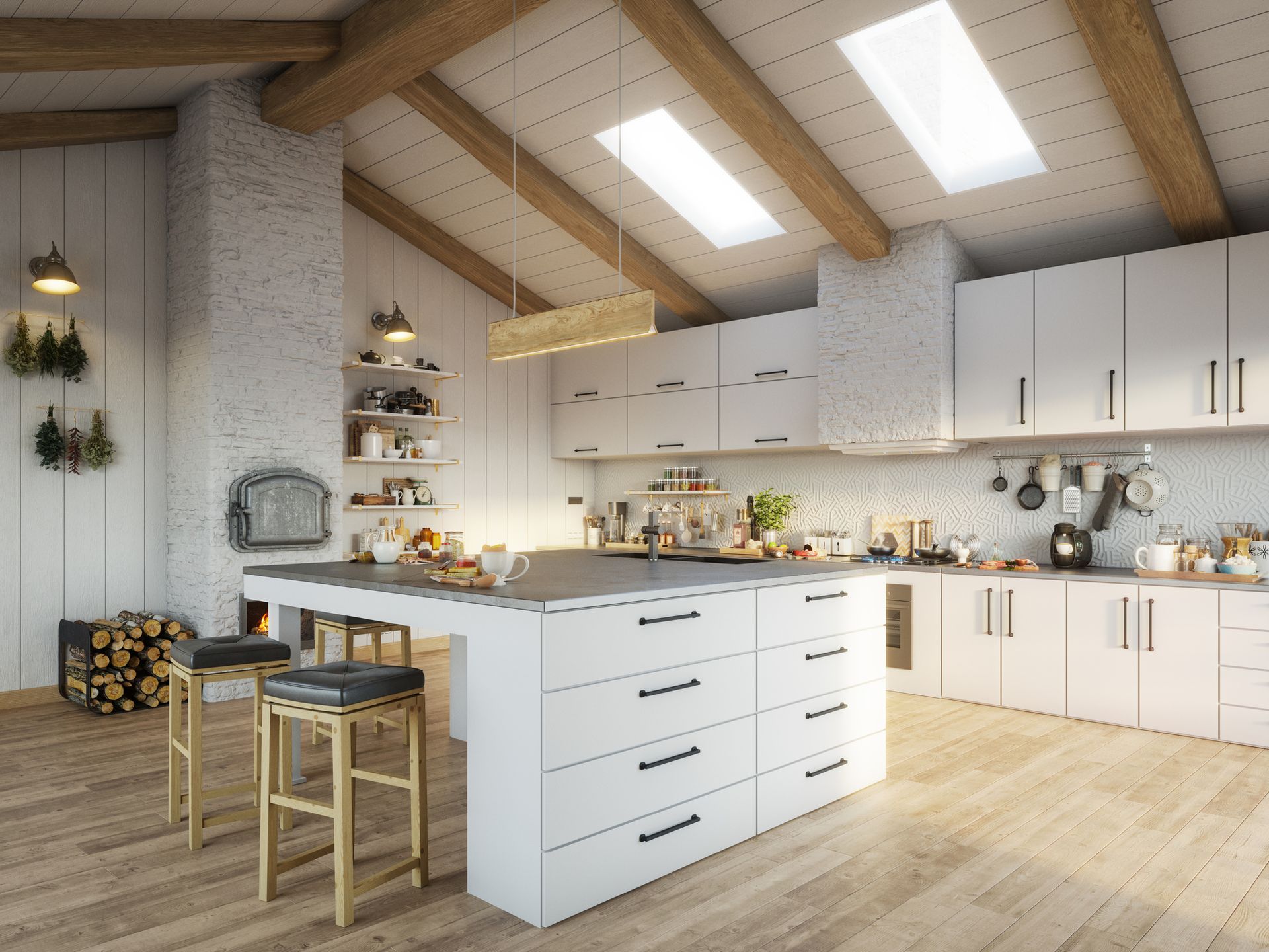 A kitchen with white cabinets and a large island in the middle