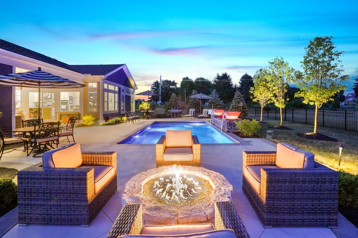 In-Ground Swimming Pool, Patio and Landscaping Installation