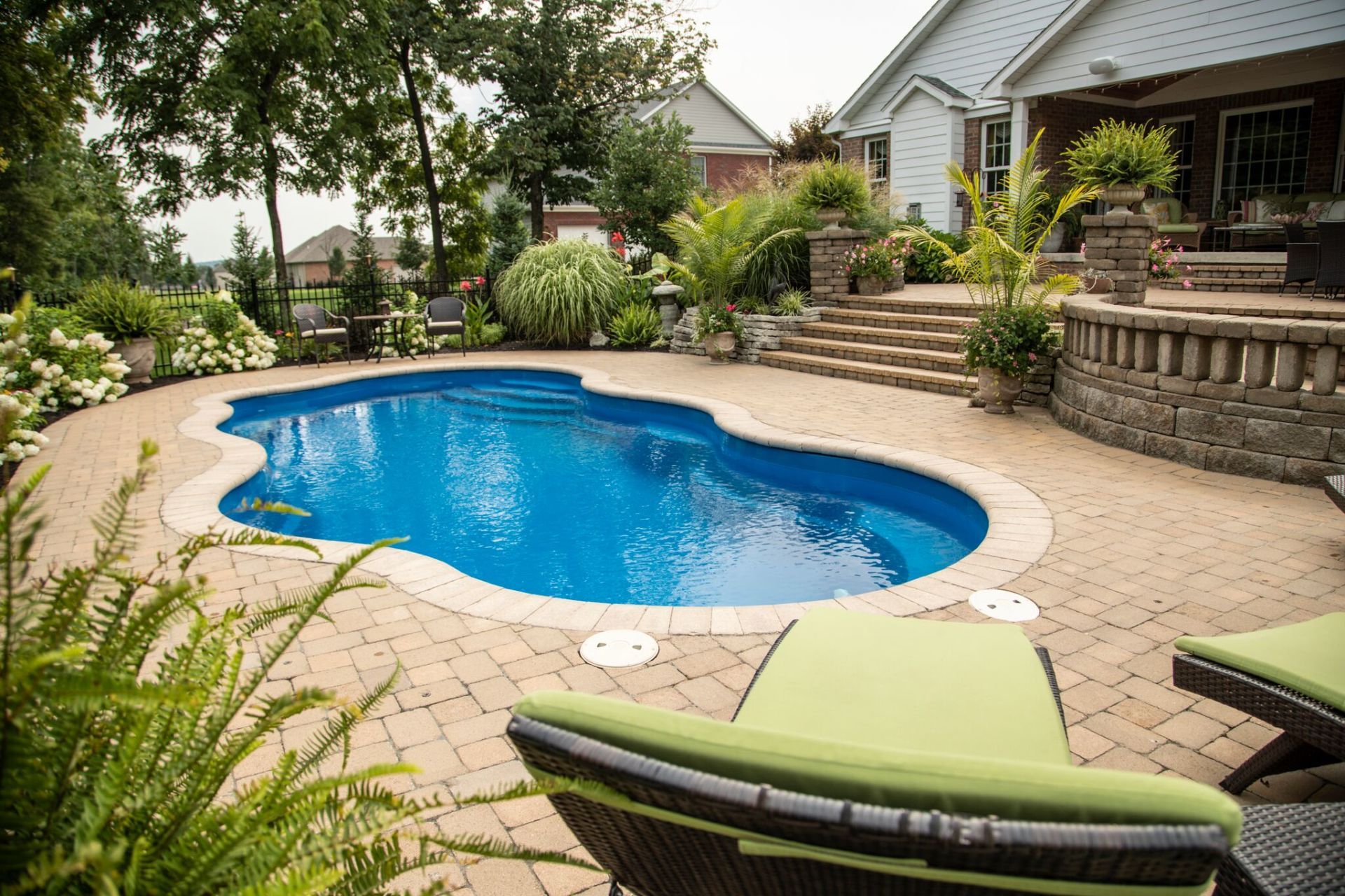Inground Swimming Pool with a Paver Pool Deck