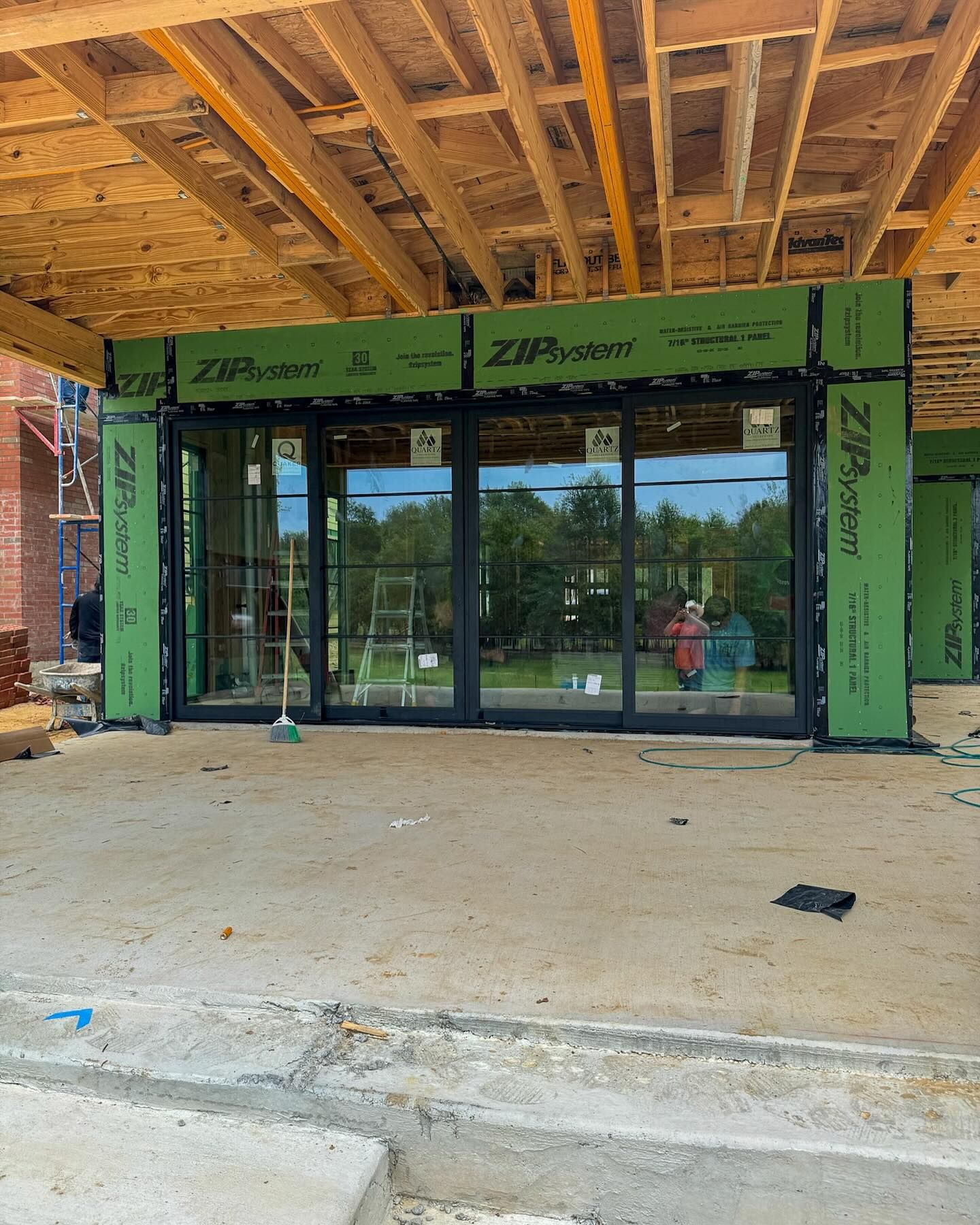 A building under construction with a lot of windows.