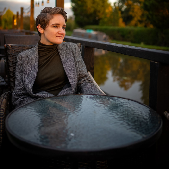 Nina Condron sitting at a table