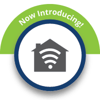 A sticker that says `` now introducing '' with an icon of a house and a wifi signal.