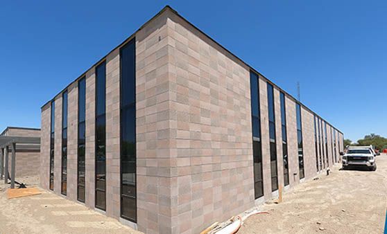 A large building with a lot of windows is being built.
