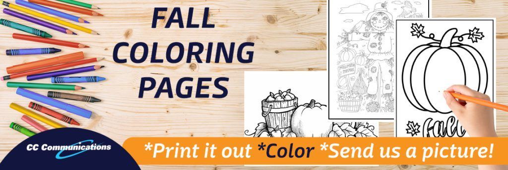 A person is drawing a pumpkin on a coloring page.