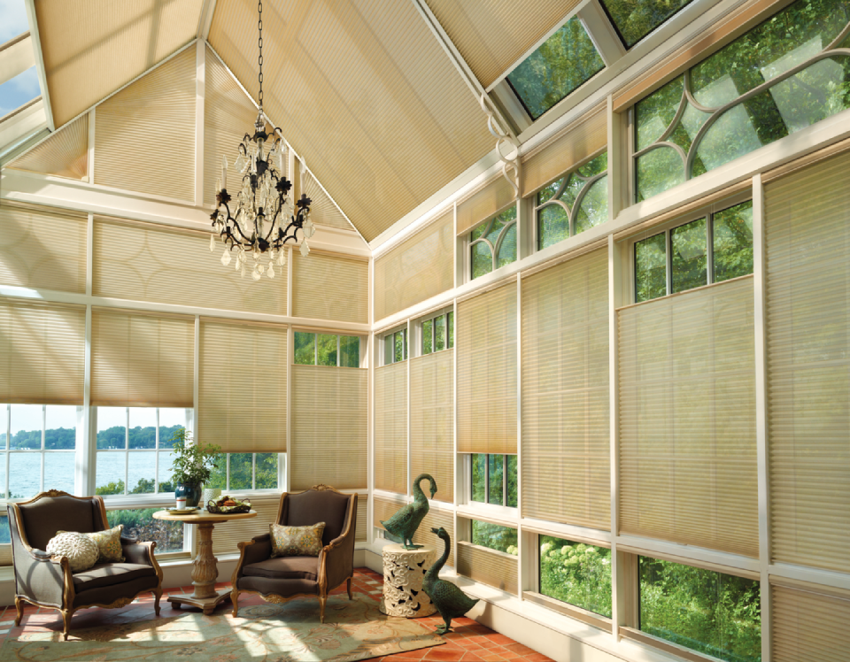 Adding skylight window treatments for homes near Wellesley and Cambridge, Massachusetts (MA) including motorized honeycomb shades