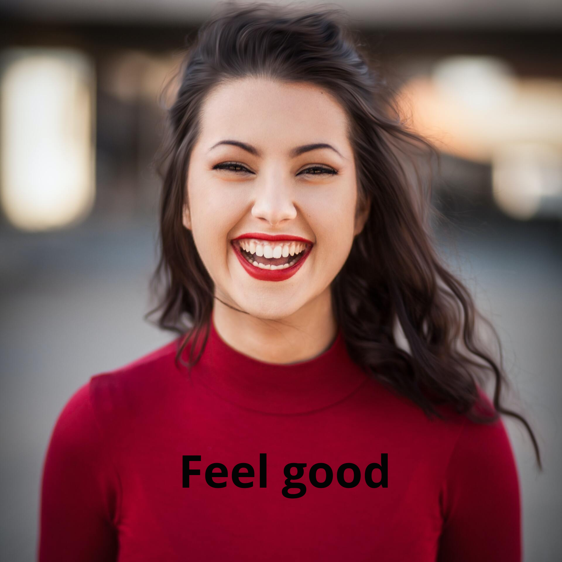 Eine Frau trägt ein rotes T-Shirt mit der Aufschrift „Feel Good“ und lächelt.