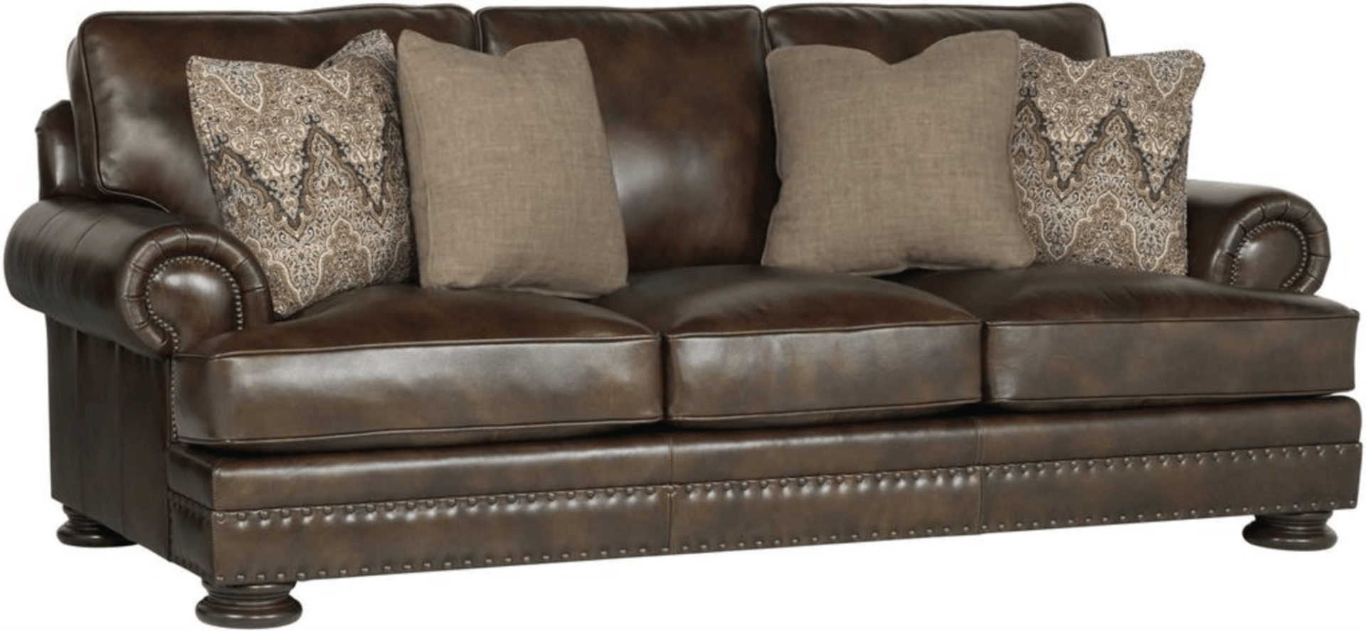 a brown leather couch with two pillows on it on a white background .