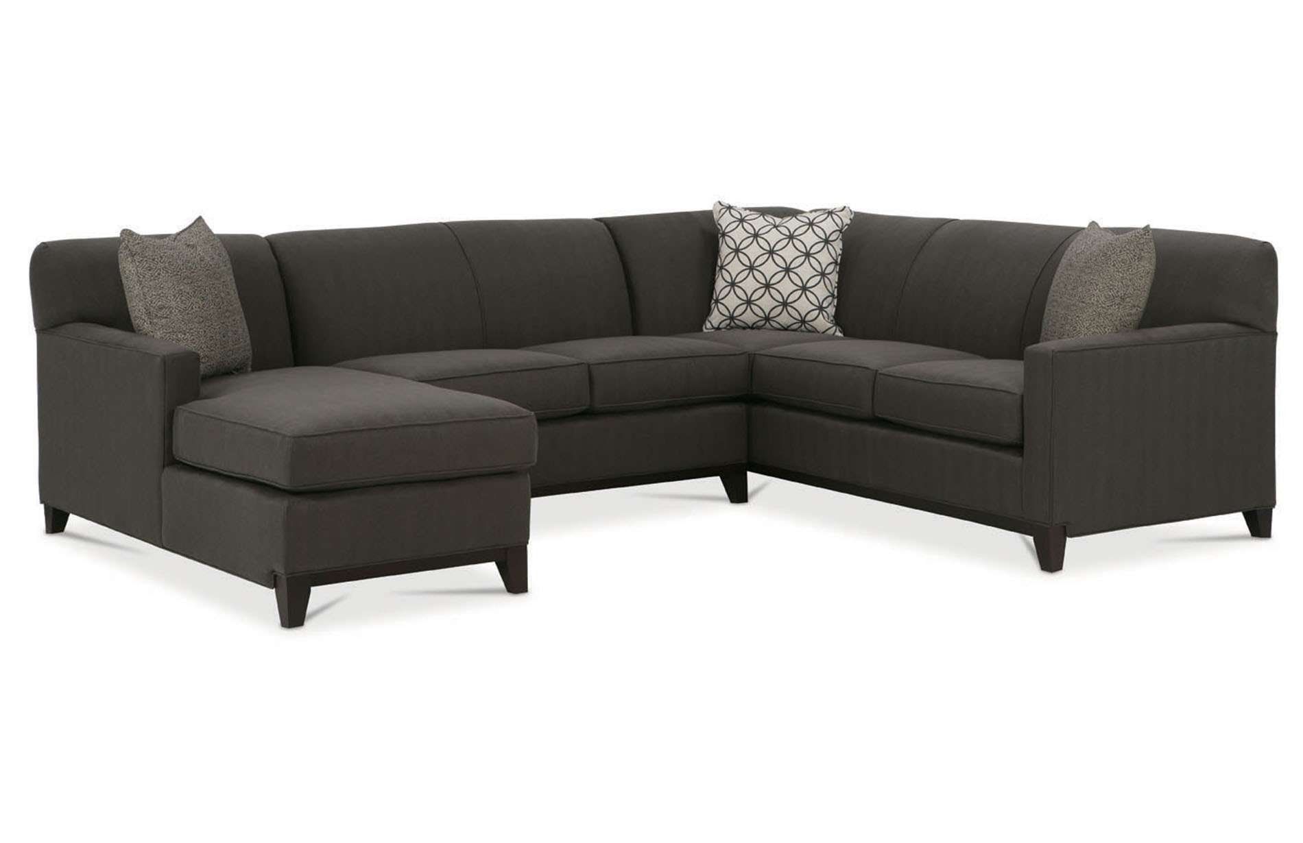 a sectional couch with a chaise lounge on a white background