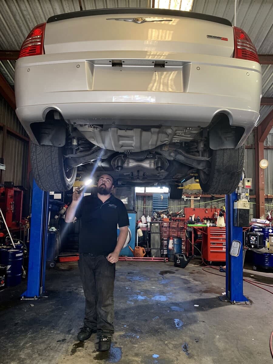 Mechanic Inspecting Car — Joe’s Auto Service Centre in Forster, NSW