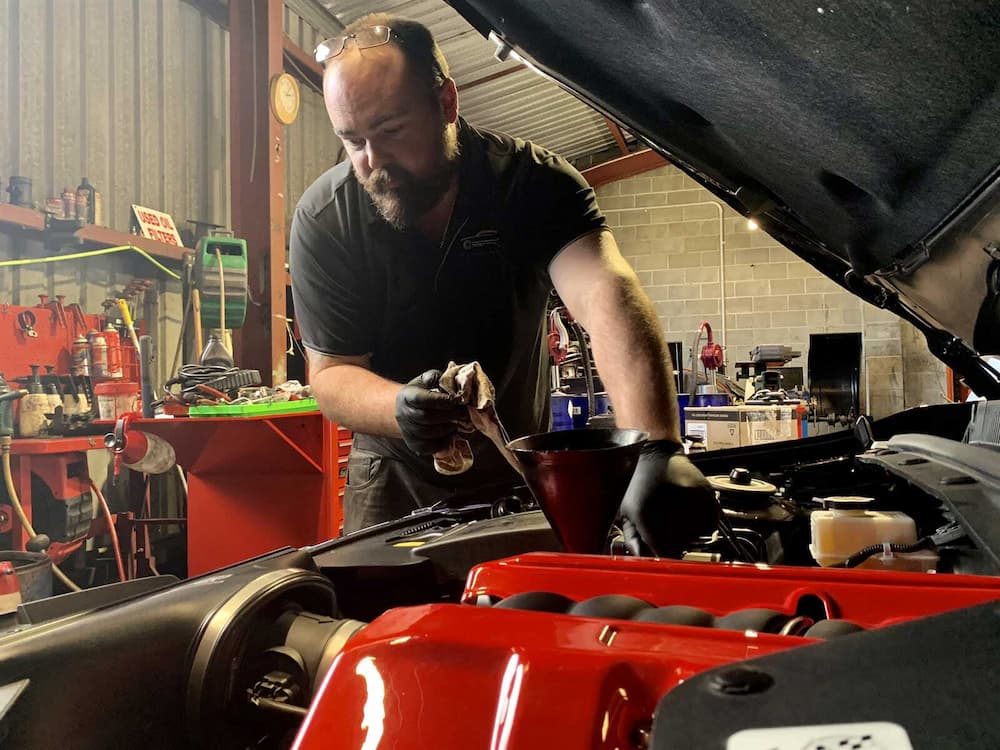 Mechanic Checking Car Engine — Joe’s Auto Service Centre in Forster, NSW