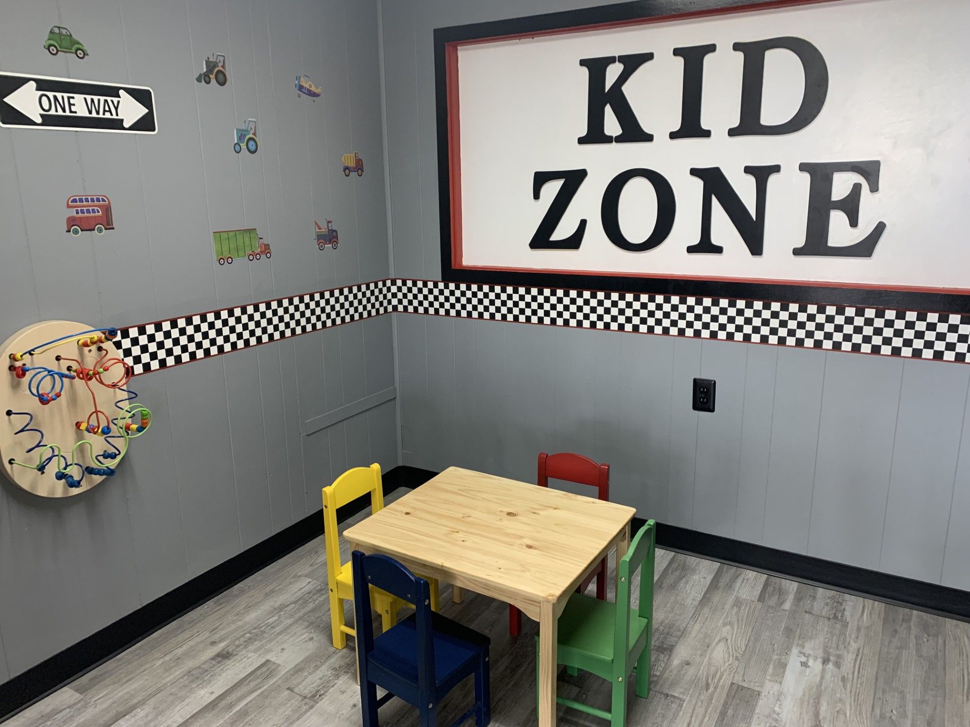 Kid's play area with a table and chairs, 