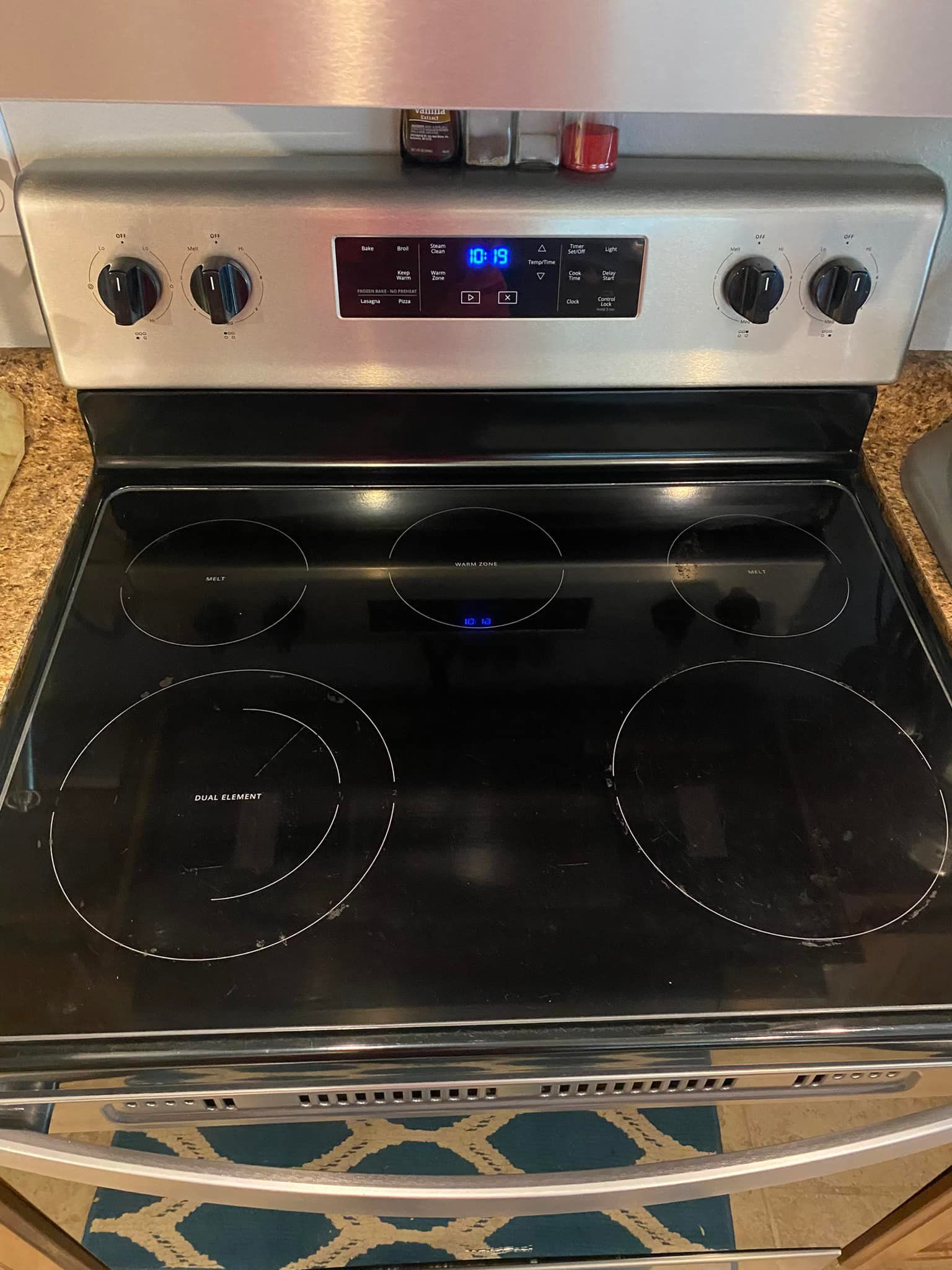 A black stove top oven is sitting on top of a counter.