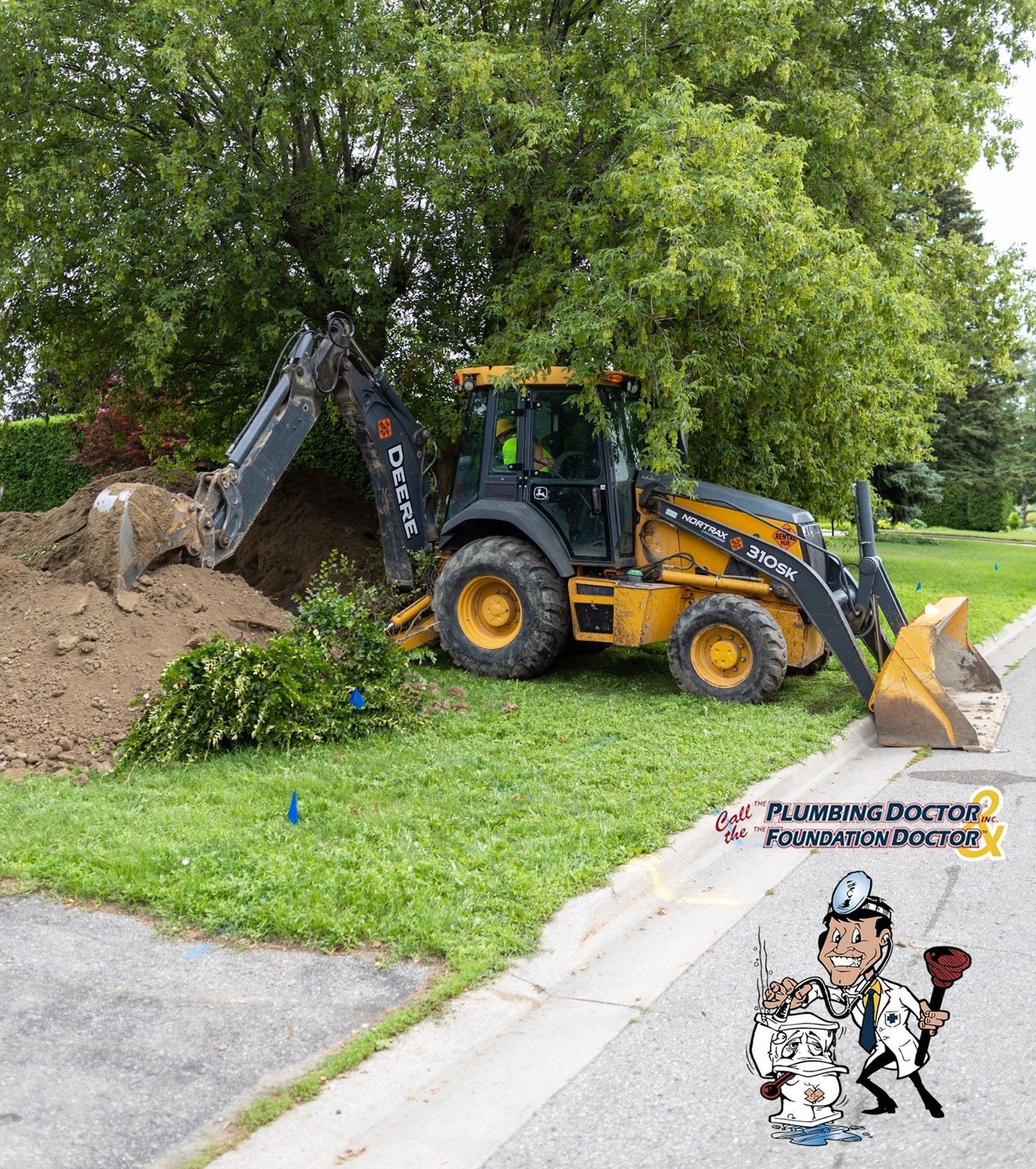 A man is pumping a hose into a septic tank.