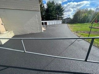 Large Yellow Truck - Worcester, MA - Patriot Seal Coating & Paving